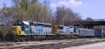 CSX 8106 & 7778 plus a passenger car are on the point of a train